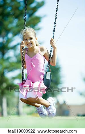 Child on swing View Large Photo Image Stock Image - Child on swing. Fotosearch