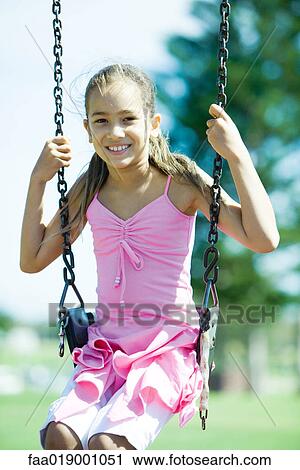 Child on swing View Large Photo Image Stock Image - Child on swing. Fotosearch