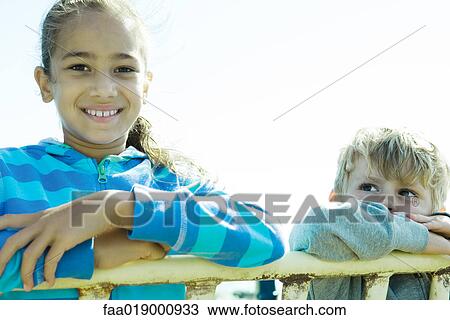 Stock Image - Children on playground equipment. Fotosearch