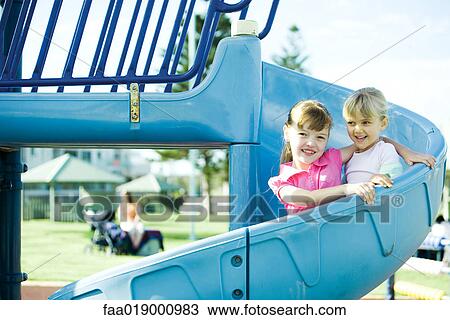 Stock Image - Children on playground equipment. Fotosearch