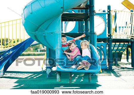 Children on playground equipment View Large Photo Image Stock Image - Children on playground equipment. Fotosearch