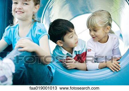 Children on playground equipment View Large Photo Image Stock Image - Children on playground equipment. Fotosearch