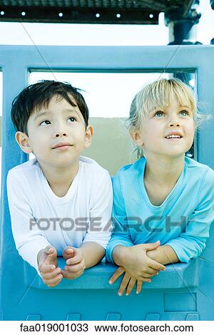 Children on playground equipment View Large Photo Image Stock Image - Children on playground equipment. Fotosearch