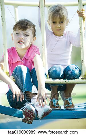 Children on playground equipment View Large Photo Image Stock Photo - Children on playground equipment. Fotosearch