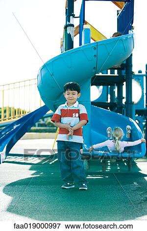 Children on playground equipment View Large Photo Image Stock Photo - Children on playground equipment. Fotosearch
