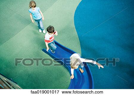 Children on playground equipment View Large Photo Image Stock Photo - Children on playground equipment. Fotosearch