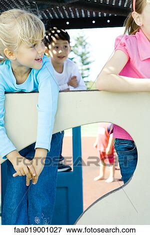 Children on playground equipment View Large Photo Image Stock Photo - Children on playground equipment. Fotosearch