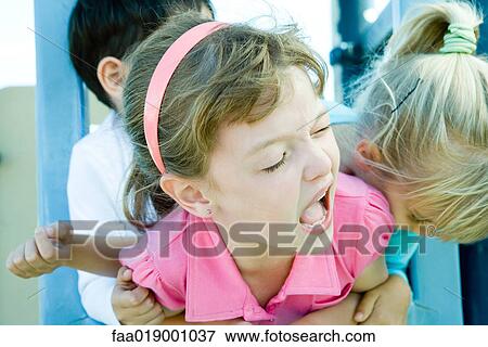 Children on playground equipment View Large Photo Image Stock Photo - Children on playground equipment. Fotosearch