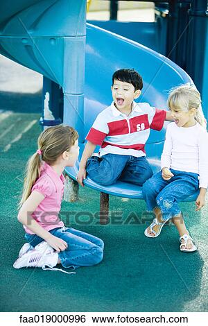 Children on playground equipment View Large Photo Image Stock Photograph - Children on playground equipment. Fotosearch