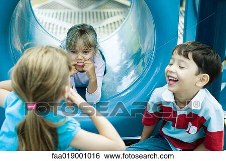 Children on playground equipment View Large Photo Image Stock Photograph - Children on playground equipment. Fotosearch