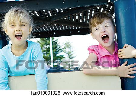 Children on playground equipment View Large Photo Image Stock Photograph - Children on playground equipment. Fotosearch