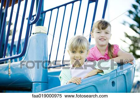 Children on playground equipment View Large Photo Image Stock Photography - Children on playground equipment. Fotosearch