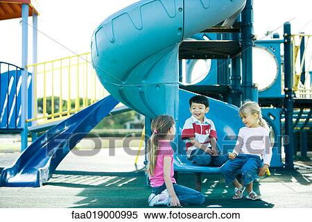 Children on playground equipment View Large Photo Image Stock Photography - Children on playground equipment. Fotosearch
