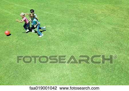 Children playing ball on grass View Large Photo Image Stock Image - Children playing ball on grass. Fotosearch