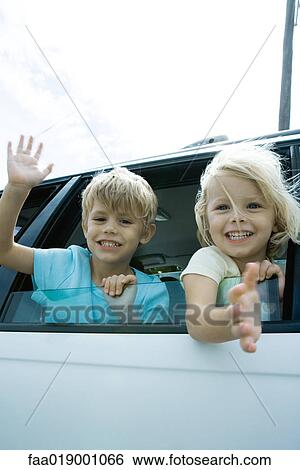 Children sticking heads out of car window, waving View Large Photo Image Stock Photograph - Children sticking heads out of car window, waving. Fotosearch