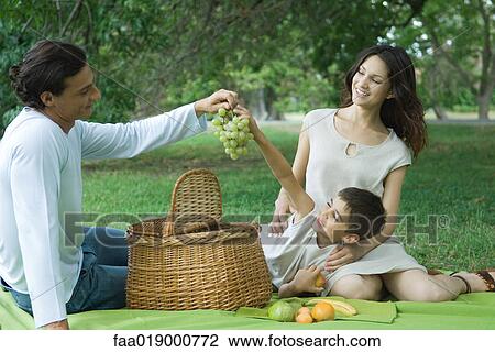 Family having picnic View Large Photo Image Stock Image - Family having picnic. Fotosearch