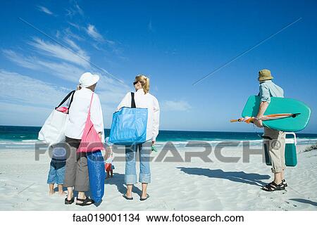Family on beach View Large Photo Image Picture - Family on beach. Fotosearch