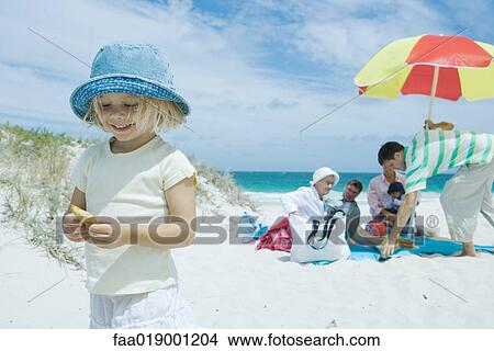 Picture - Family on beach. Fotosearch
