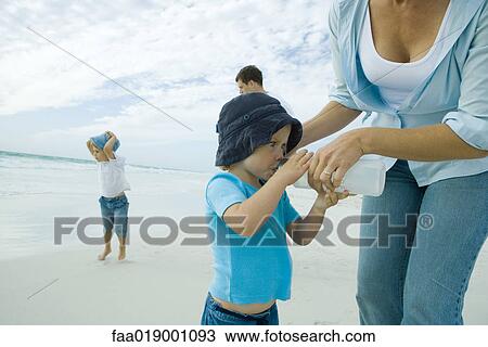 Family on beach View Large Photo Image Stock Image - Family on beach. Fotosearch