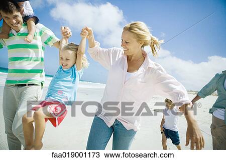 Family on beach View Large Photo Image Stock Image - Family on beach. Fotosearch