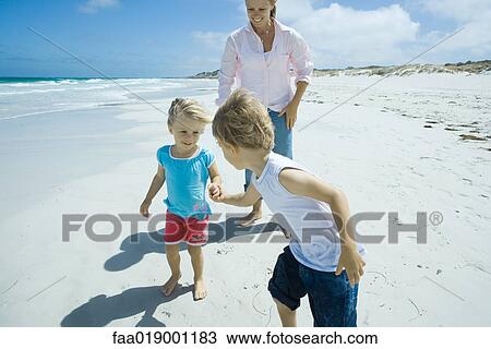 Family on beach View Large Photo Image Stock Image - Family on beach. Fotosearch