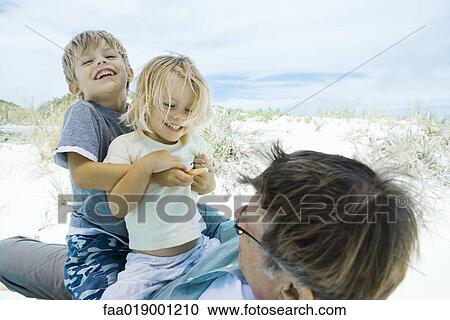 Family on beach View Large Photo Image Stock Image - Family on beach. Fotosearch