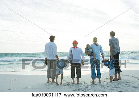 Family on beach View Large Photo Image Stock Photo - Family on beach. Fotosearch