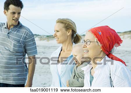 Stock Photo - Family on beach. Fotosearch