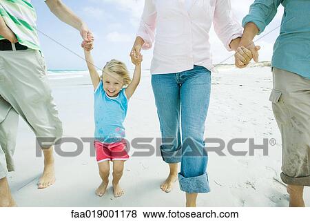 Family on beach View Large Photo Image Stock Photo - Family on beach. Fotosearch