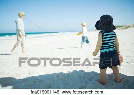 Family on beach View Large Photo Image Stock Photograph - Family on beach. Fotosearch