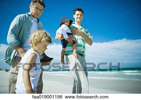 Family on beach View Large Photo Image Stock Photograph - Family on beach. Fotosearch