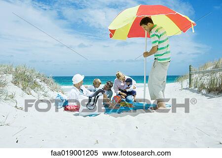 Family on beach View Large Photo Image Stock Photography - Family on beach. Fotosearch