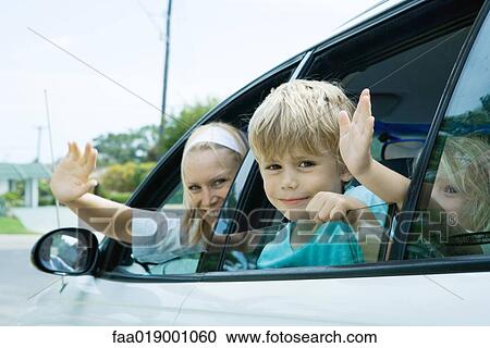 Family waving from car windows View Large Photo Image Stock Image - Family waving from car windows. Fotosearch