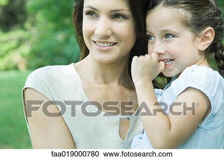 Stock Image - Girl and mother, portrait. Fotosearch