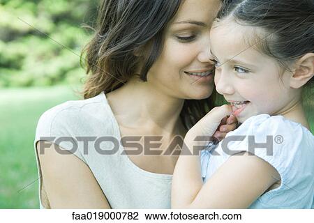 Girl and mother, smiling, portrait View Large Photo Image Stock Image - Girl and mother, smiling, portrait. Fotosearch