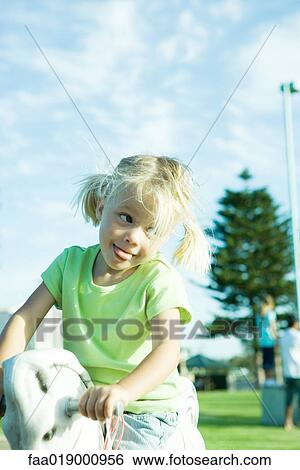 Girl on playground View Large Photo Image Stock Photograph - Girl on playground. Fotosearch