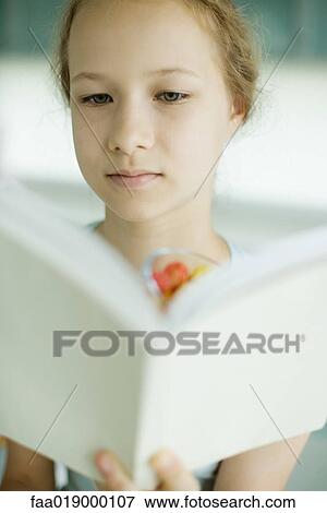 Girl reading book View Large Photo Image Stock Photo - Girl reading book. Fotosearch