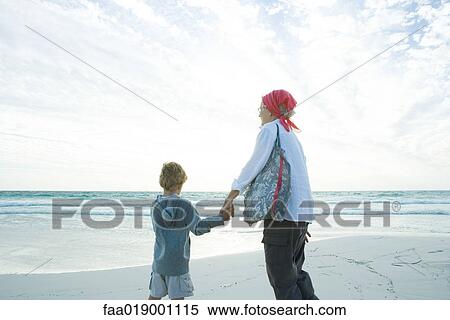Grandmother and grandson on beach View Large Photo Image Stock Photography - Grandmother and grandson on beach. Fotosearch