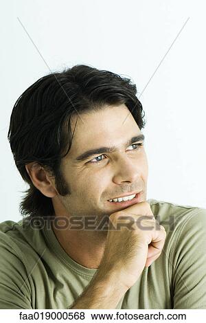 Man, hand under chin, smiling, portrait View Large Photo Image Stock Photo - Man, hand under chin, smiling, portrait. Fotosearch