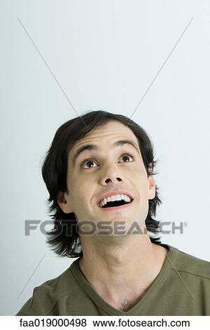 Man, head back, raising eyebrows, portrait View Large Photo Image Stock Photo - Man, head back, raising eyebrows, portrait. Fotosearch