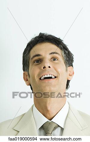 Picture - Man, head back, smiling, portrait. Fotosearch