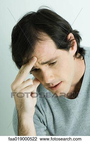 Man, holding head, portrait View Large Photo Image Stock Image - Man, holding head, portrait. Fotosearch