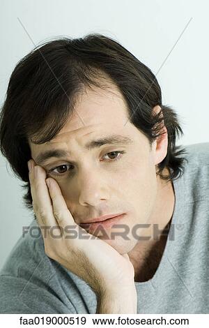Stock Photo - Man, holding head, portrait. Fotosearch