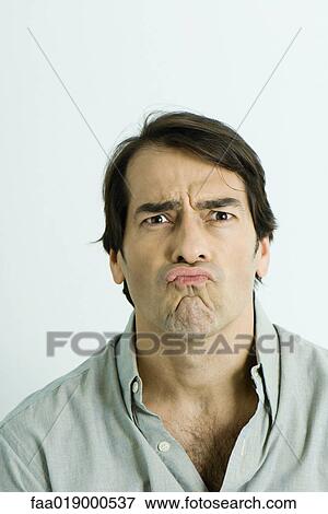 Man making face, portrait View Large Photo Image Stock Photo - Man making face, portrait. Fotosearch