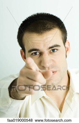 Man pointing at camera, portrait View Large Photo Image Stock Photo - Man pointing at camera, portrait. Fotosearch