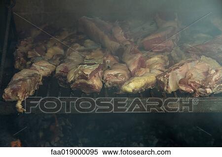 Meat grilling in barbecue View Large Photo Image Stock Photography - Meat grilling in barbecue. Fotosearch