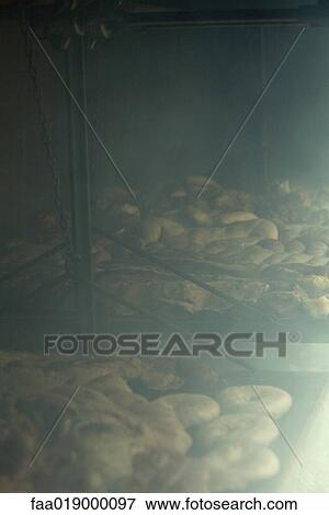 Meats grilling in barbecue View Large Photo Image Stock Photo - Meats grilling in barbecue. Fotosearch