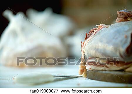 Slab of beef and knife View Large Photo Image Stock Photo - Slab of beef and knife. Fotosearch