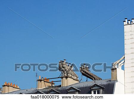 Smoke stacks on top of apartment building View Large Photo Image Stock Photography - Smoke stacks on top of apartment building. Fotosearch