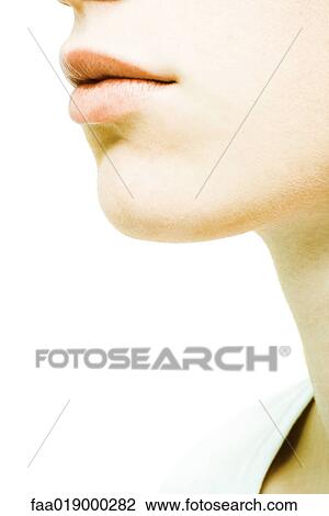Stock Image - Teen girl's lower face, close-up. Fotosearch